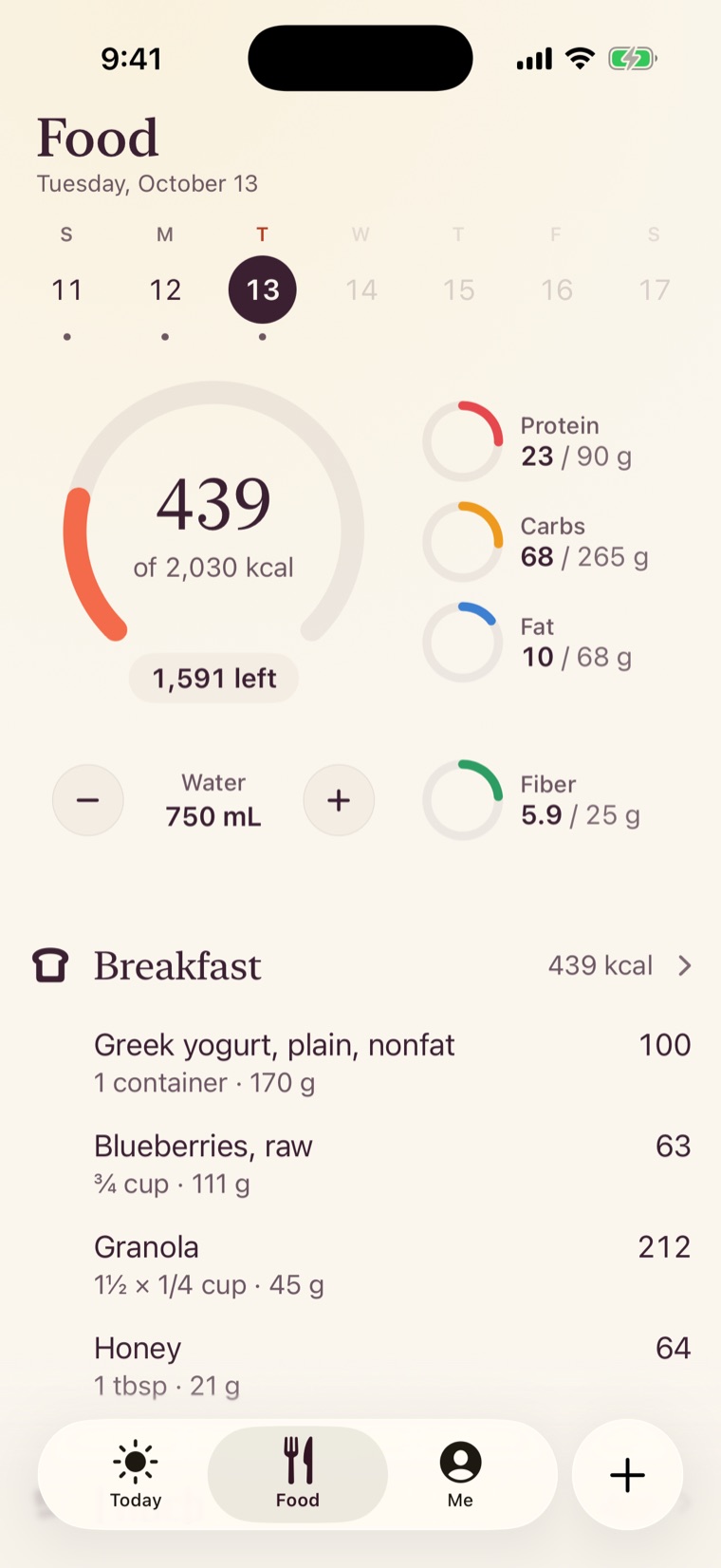 The Food tab with a calorie gauge, protein, carbs, fat and fiber rings, water and the day’s meals